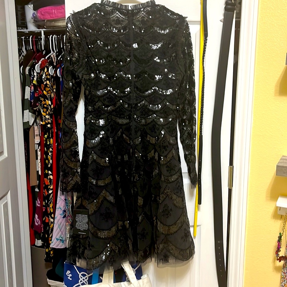Offers welcome!NWT Needle and Thread mini dress- US size 6- too small for me
